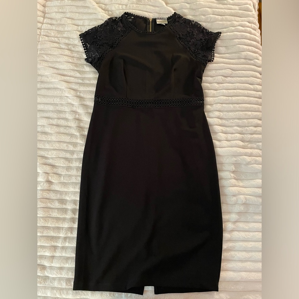 Lace detai, black form fitting dress, size 14, gently worn. No longer fits